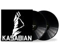 Vinyl records with a white silhouette of a person and the word 'Kasabian' on a black background